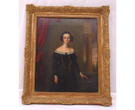 A framed oil on canvas portrait of a Victorian young lady in black dress with gold chain, 49 x 40cm