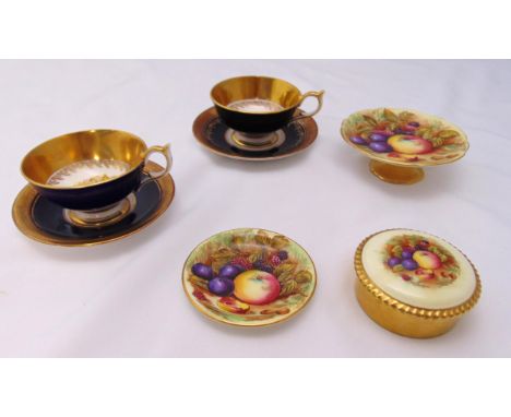 A quantity of Aynsley Fallen fruit porcelain to include two cups and saucers, a bonbon dish, a circular covered box and a dis