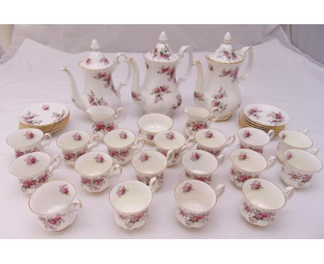Royal Albert Lavender Rose coffee service to include three coffee pots, cups, saucers, milk jugs and a sugar bowl (40)