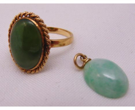 9ct gold and jadeite ring and a jadeite pendant