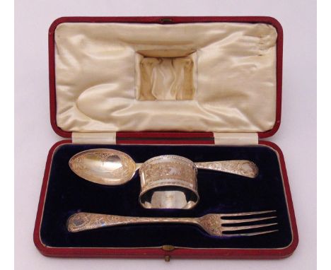 A cased hallmarked silver Christening set to include spoon, fork and napkin ring, Sheffield 1908, approx weight of silver 105