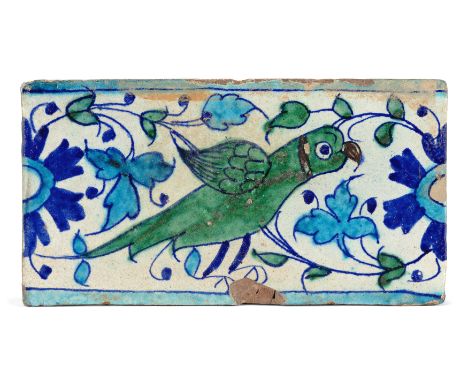 A rectangular, green, cobalt blue and turquoise blue, figural border pottery tile,Multan, first quarter of 19th century, Pain