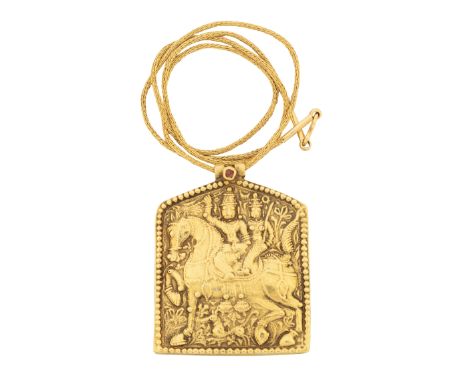 A repousse gold pendant depicting Shiva and Parvati on horseback South India or Bengal, 19th century5.3 cm high x 4.3cm. wide