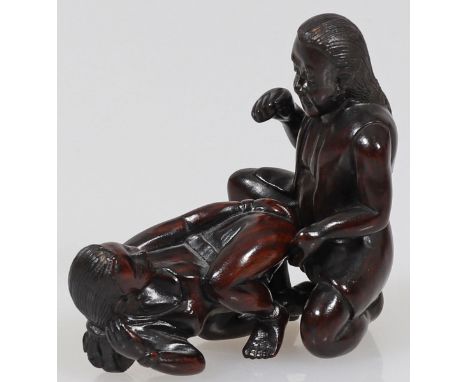   Netsuke  Japan, 20. Jahrhundert. - "Paar beim Liebesspiel" - Teak. H. 6 cm. Sign.          