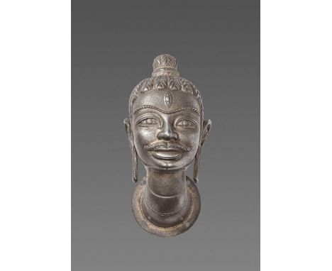 Champa, 10th-12th century. The head displaying the classic iconography of Shiva, the central deity of the Cham people, with l