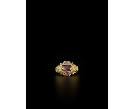 Champa, 10th-13th century. The richly decorated ring set with a rectangular amethyst at the top and two small oval amethysts 