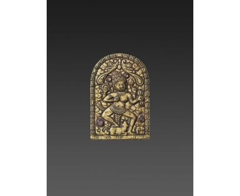 Champa, 12th-14th century. The pectoral of rectangular form with an arched top, executed in fine repoussé with the four-armed