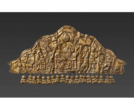 Gandhara, c. 2nd century. The diadem of triangular form, with fine repoussé depicting Buddha in the center, wearing a long-fl