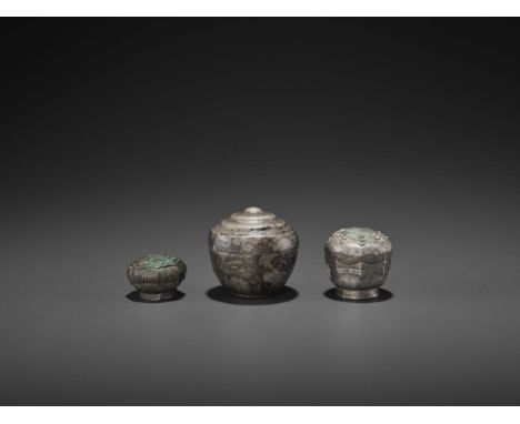 Champa, 10th-14th century. One box of globular shape and two of octagonal form, each executed in fine repoussé with floral an