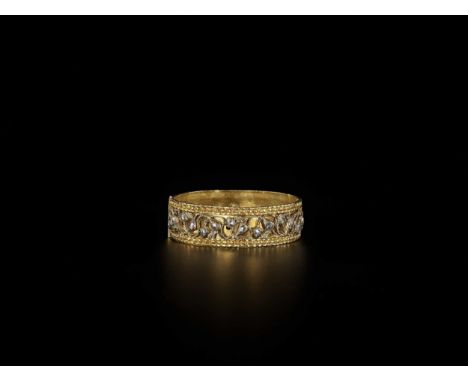 Indonesia, Jambi, Eastern Sumatra, early 20th century. The hinged gold bangle with 28 rose-cut intan diamonds set in a finely