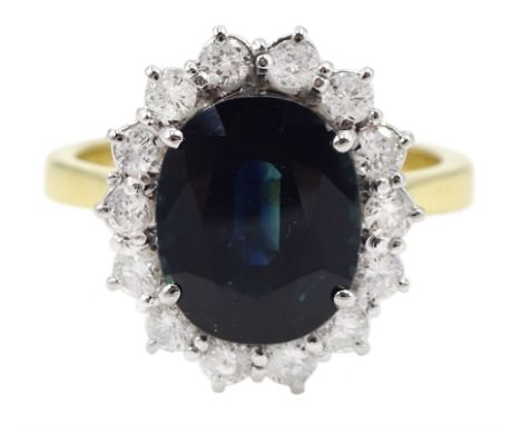 18ct gold oval sapphire and round brilliant cut diamond cluster ring, hallmarked, sapphire approx 2.85 carat, total diamond w