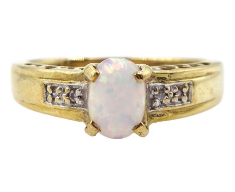 9ct gold oval opal ring with diamond set shoulders, hallmarked Condition Report:Approx 2.7gm, size O-P, good condition 