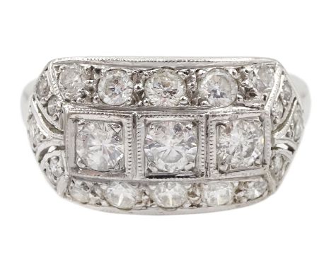 White gold milgrain set diamond curved panel ring, three round brilliant cut diamonds, with pierced diamond set surround, sta