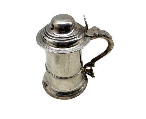 Early George III silver lidded tankard, the domed hinged cover with pierced scroll form thumbpiece and S scroll handle H20cm 