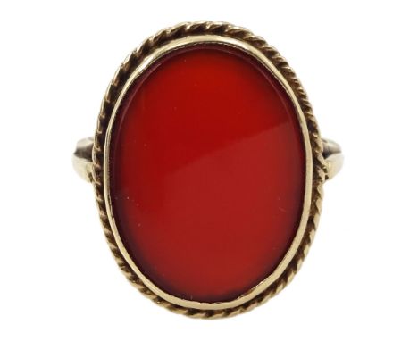 9ct gold single stone oval carnelian ring, Birmingham 1972Condition Report:Approx 3.45gm, size M, overall head = 21mm x 15mmc