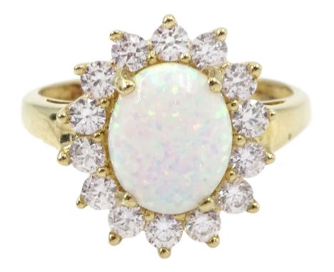 14ct gold opal and cubic zirconia cluster ring, stamped 585Condition Report:Approx 4.25gm, size P-Q, overall head = 16mm x 14
