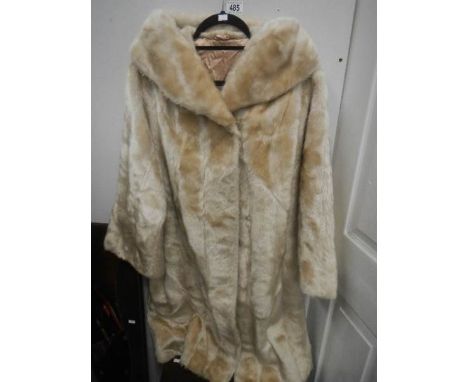 A white fur coat.