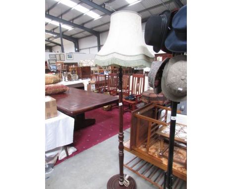 A standard lamp with shade.