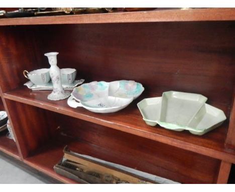 A mixed lot of pottery including Carlton ware, art deco leaf dish, Avon pottery etc.,