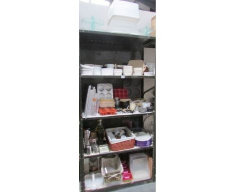 5 shelves of kitchen ware including cake board, baking tins, cooking tools, wicker baskets etc.,