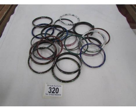 Approximately 20 Michaela  Frei enamel bangles.
