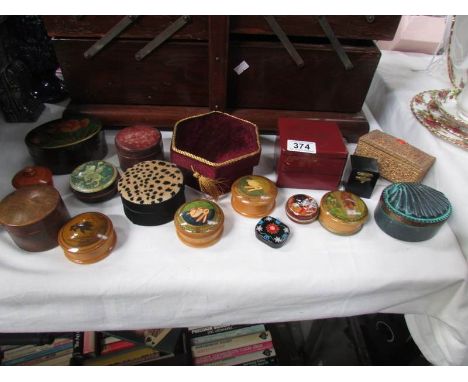 A mixed lot of pill and trinket boxes.