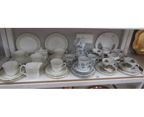 A shelf of assorted tea ware.