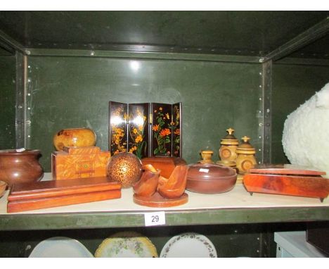 A shelf of assorted wooden items including smoking related.