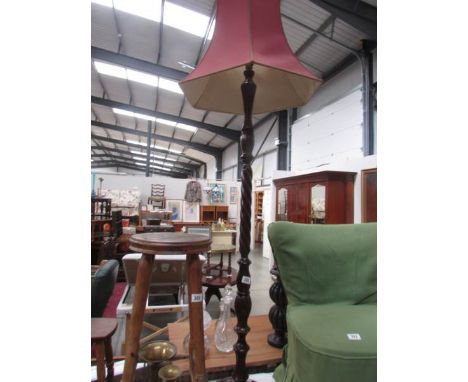 A standard lamp with shade.