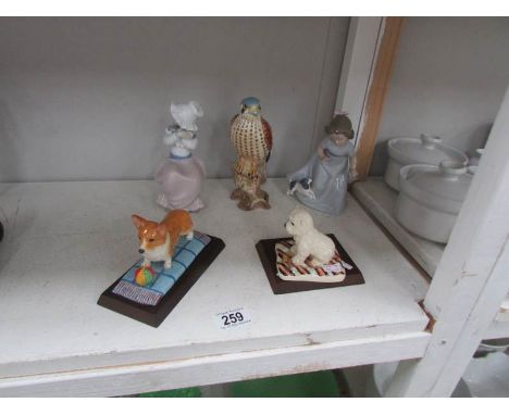 A Beswick kestres (repaired), 2 Royal Doulton animals being a corgi and a west highland terrier and 2 NAO figures of girls wi