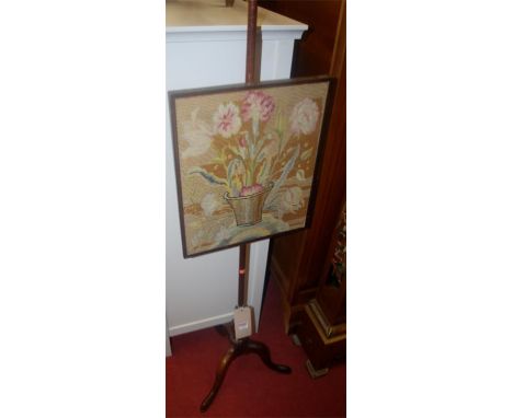 A 19th century mahogany and floral tapestry inset pole screen 