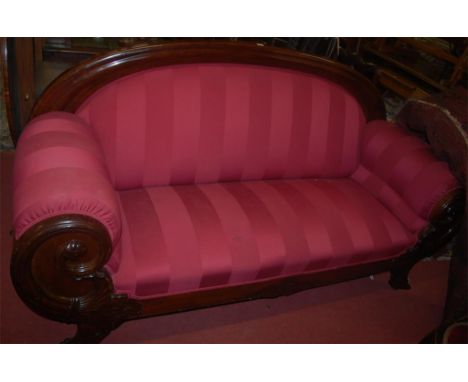 A contemporary Continental mahogany framed and red striped upholstered three seater sofa, having floral scroll carvings, w. 2