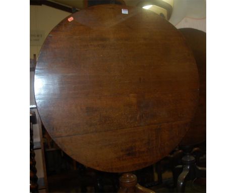 A George III oak circular tilt-top tripod table; together with similar mahogany example (2)  Condition Report / Extra Informa