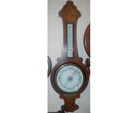 A late Victorian rosewood and floral satinwood inlaid two dial aneroid wheel barometer
