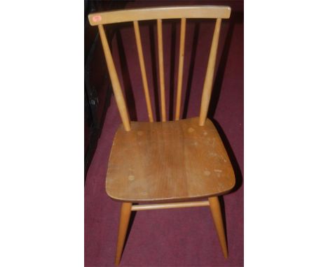 A set of four 1960s Ercol light elm stickback kitchen chairs