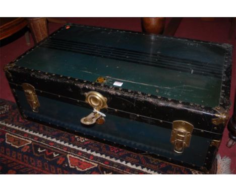 A circa 1900 Canadian painted metal hinged top travelling trunk, with fitted interior and end carry handles, by Eveleigh 