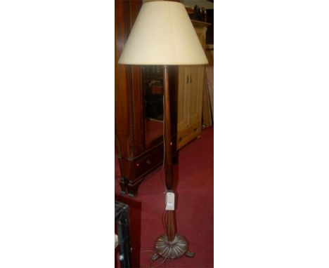 A turned mahogany standard lamp