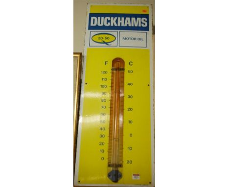 A Duckhams enamel advertising sign, with integrated thermometer, 91 x 33.5cm 