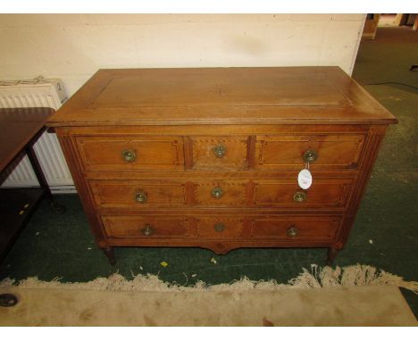 A 19th century pale mahogany chest of five drawers, overall in the French style, the top with stringing and star inlay, engin