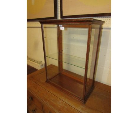 Oak framed glazed table top display cabinet, glazed to the top and all sides with a single hinged door, rests for two shelves