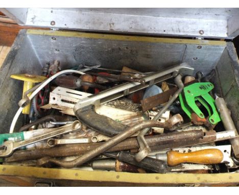 An ebonised pine work box containing various tools including spanners etc