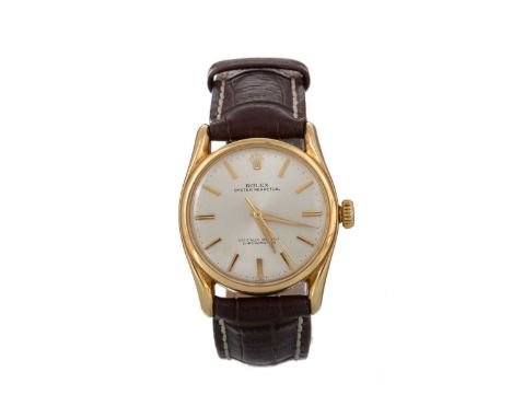 ROLEX OYSTER PERPETUAL EIGHTEEN CARAT GOLD AUTOMATIC WRIST WATCH the round dial with baton hour markers, outer seconds track 