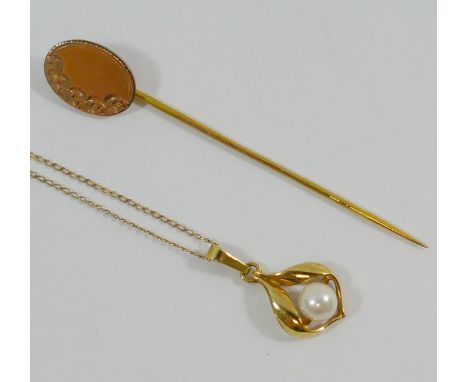 A yellow metal cultured pearl set pendant stamped '375' and chains stamped '9K', combined weight 1.8g, and a stick pin CONDIT