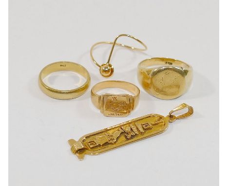 A quantity of 18 carat gold and yellow metal items stamped '750' and '18CT', comprised of a pendant, wedding band, two signet