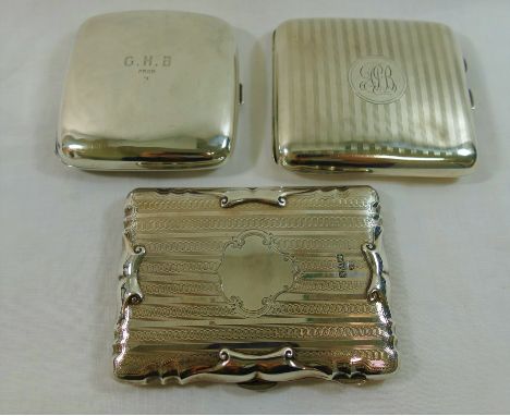 A silver combination card case and aide memoire, Chester 1908, lined with green leather and containing a small silver pencil,