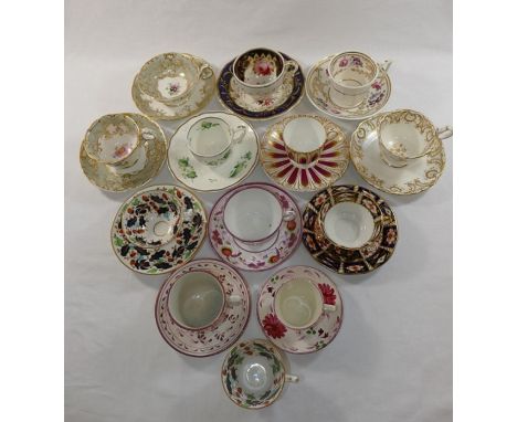 A collection of Regency and later tea and coffee cups and saucers including an early 19th century porcelain trio, possibly Sp