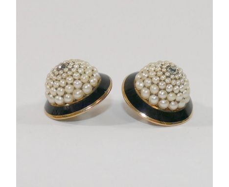 A pair of yellow metal seed pearl, black enamel and diamond bombè shaped dress studs, the centre of each stud set with a smal