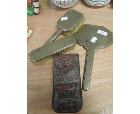 An early 20th Century dressing table set, possibly Continental silver (stamped 830S) and a cased 'Rolls' razor