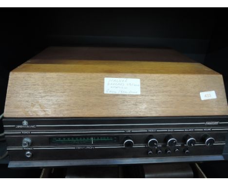 A vintage table top radiogram by Hacker, having Garrard SP25 deck