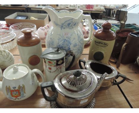 A selection of ceramics including wash jug, ceramic bed warmers, lidded Johnson jug and plated ware etc